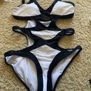 Sexy white and black one piece swimsuit with cut outs